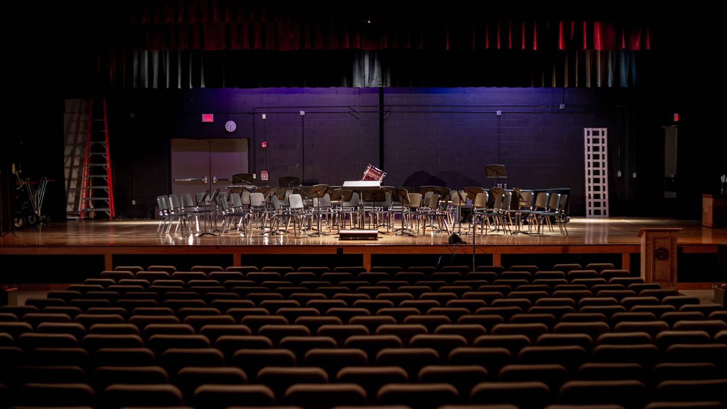 empty stage with chairs