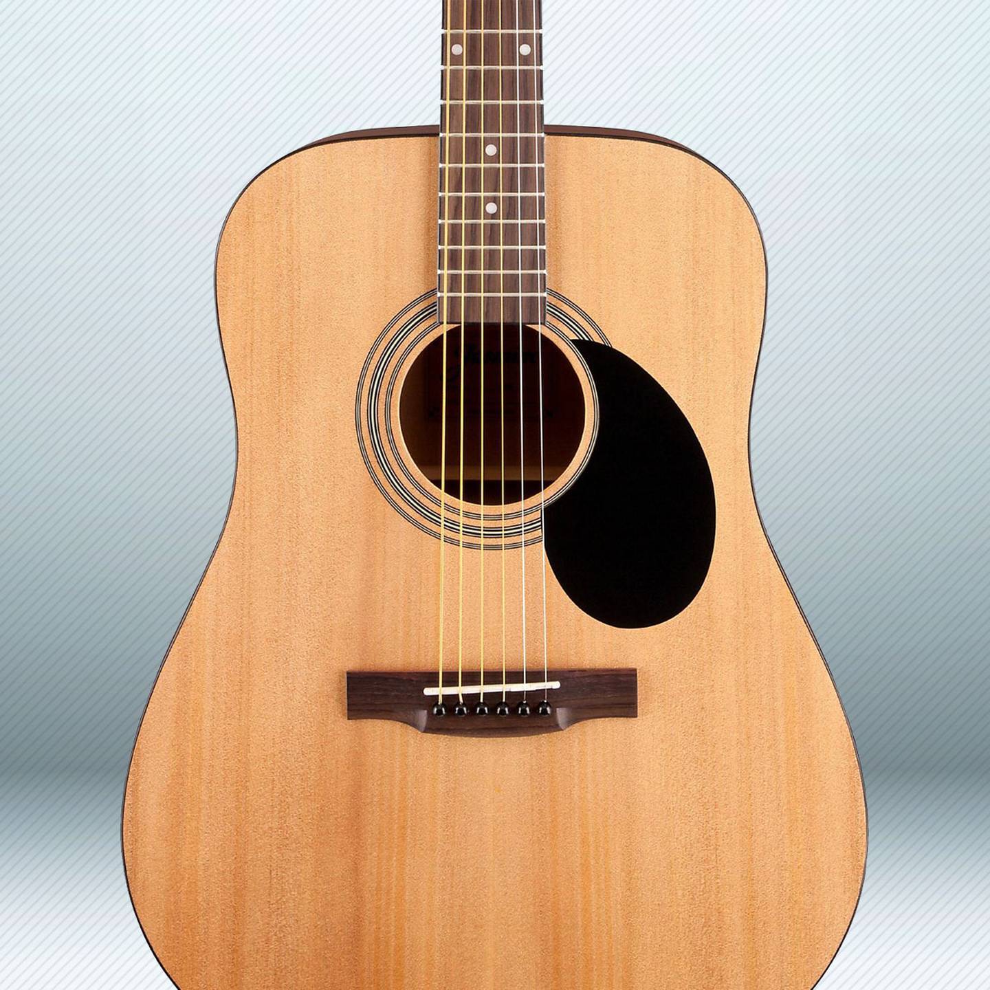 a close up of an accoustic guitar